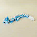 Raised scale texture for tracing plus flexible body; quiet non-click feedback; blue-to-white PLA dragon, 25 cm.
