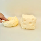 Large handheld squish fidget with deep squeeze feel for relaxing, grounding and sensory regulation.