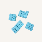 Pocket-sized blue glow in the dark infinity cube designed for smooth one-handed fidgeting.