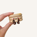 Small smiley pancake collectable made for neuro-friendly workspaces, cosy corners and everyday display
