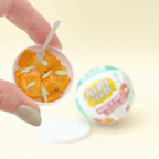 Themed blind ball activity with a hidden mini set inside to open, make, and keep
