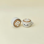 Coffee-themed sensory clicker for tactile input, grounding, repetitive pressing and neurodivergent support.