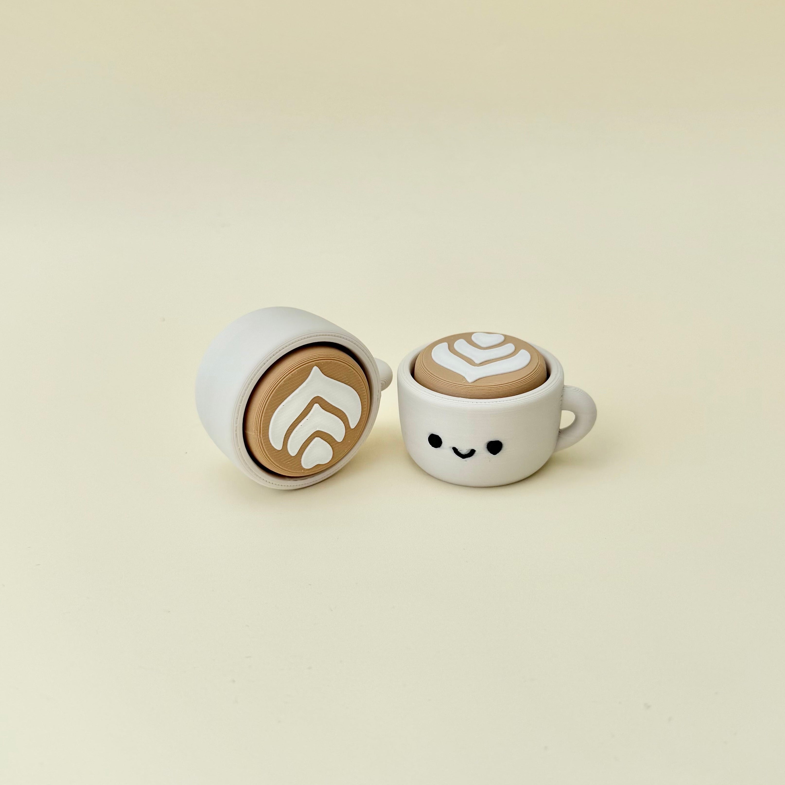 Coffee-themed sensory clicker for tactile input, grounding, repetitive pressing and neurodivergent support.