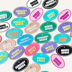 Oval message tag with tactile lettering and simple loop attachment for everyday setups.