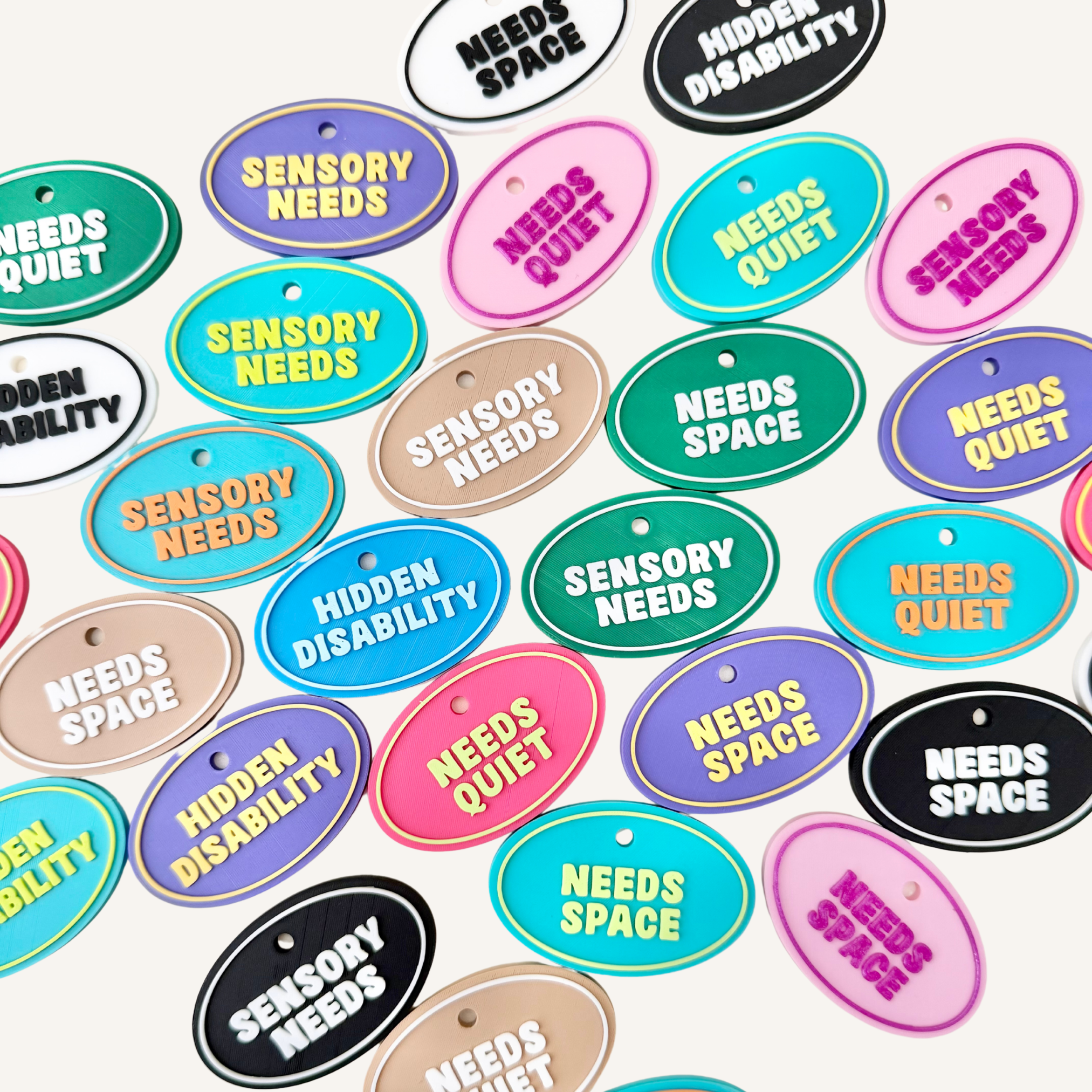 Oval message tag with tactile lettering and simple loop attachment for everyday setups.