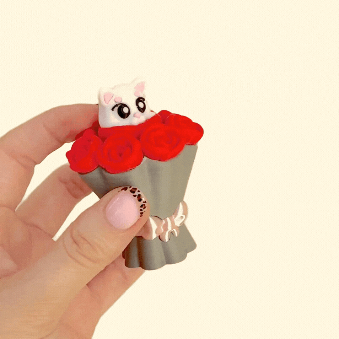 Decorative sensory clicker featuring a cat centre and smooth press mechanism.
