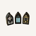 Small stained-glass inspired clicker charm with black sparkle frame and detailed gothic design for tactile everyday use.
