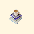 Book-stack fidget clicker with mug button, 4 cm tall, keyring hole, click or quiet option, smooth cup and ridged spines for tactile focus.
