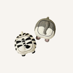 Novelty animal bum clicker available as a zebra or corgi with satisfying mechanical click.