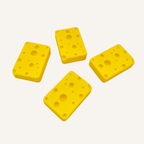 Tiny cheese-shaped magnetic fidget with tactile holes, smooth movement and desk-friendly sensory use.