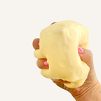 Chunky gel-filled cheese squish with a slightly tacky finish for slow, satisfying squeezes.