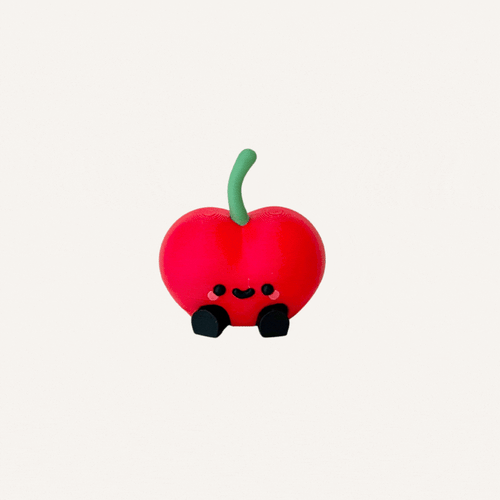 Cute mini fruit character with dangling legs designed for desk, shelf and bedside decor in neuro-friendly spaces

