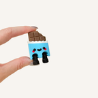 Small smiley chocolate collectable made for neuro-friendly workspaces, cosy corners and everyday display
