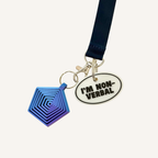 Easy-read communication tag with raised text and keyring loop for daily use.