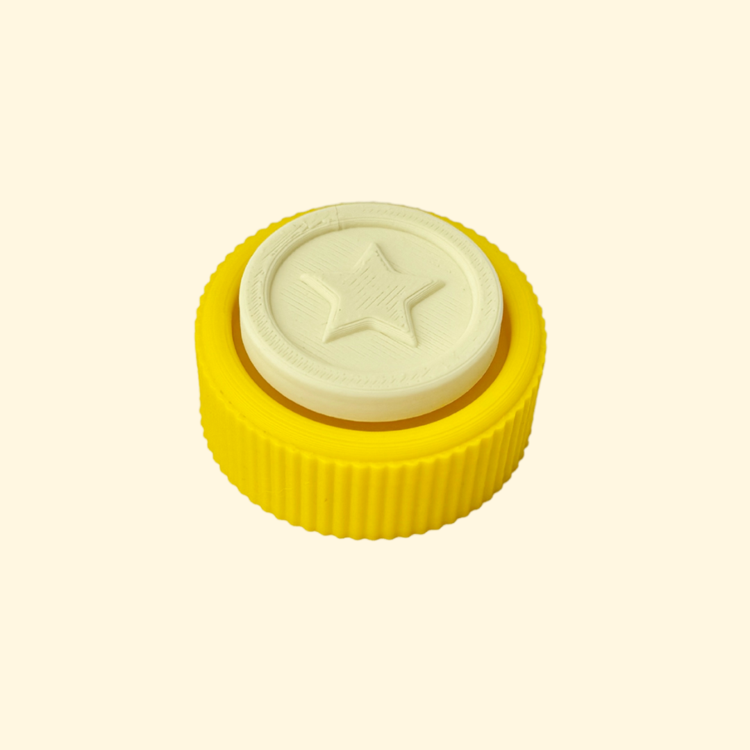 Bright yellow fidget toy shaped like a star with tactile features.