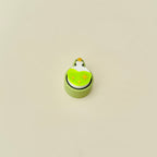 Sensory tool with a textured top and central click feature in a magical potion theme