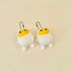 Small handheld sensory clicker keyring with smooth finish and satisfying yolk press, great for busy hands on the go.
