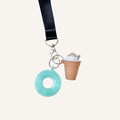 Custom lanyard clicker shaped like a whipped drink with tactile details and optional quiet click.
