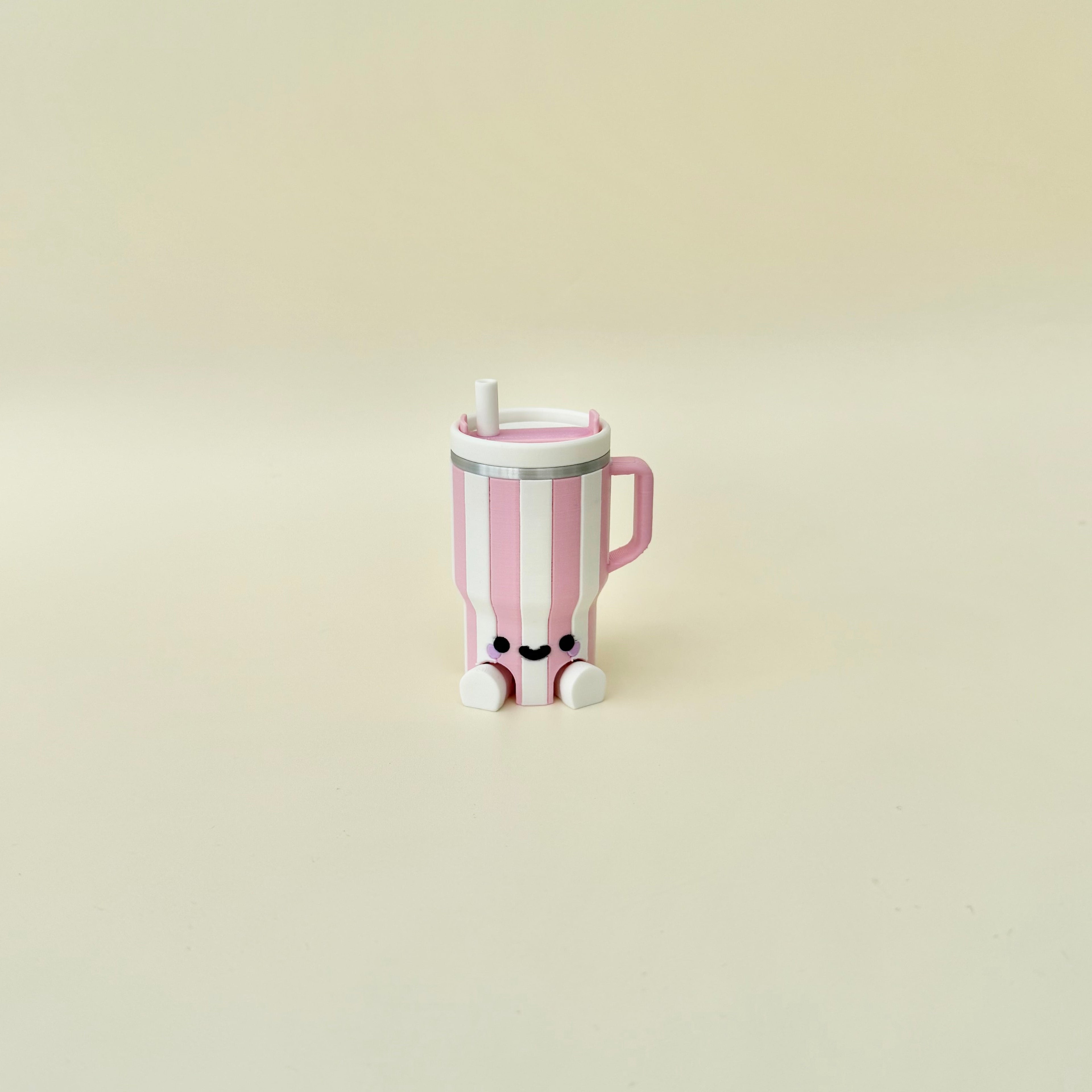 Cute collectable cup clicker with smooth texture, desk buddy style and neurodivergent-friendly sensory use.