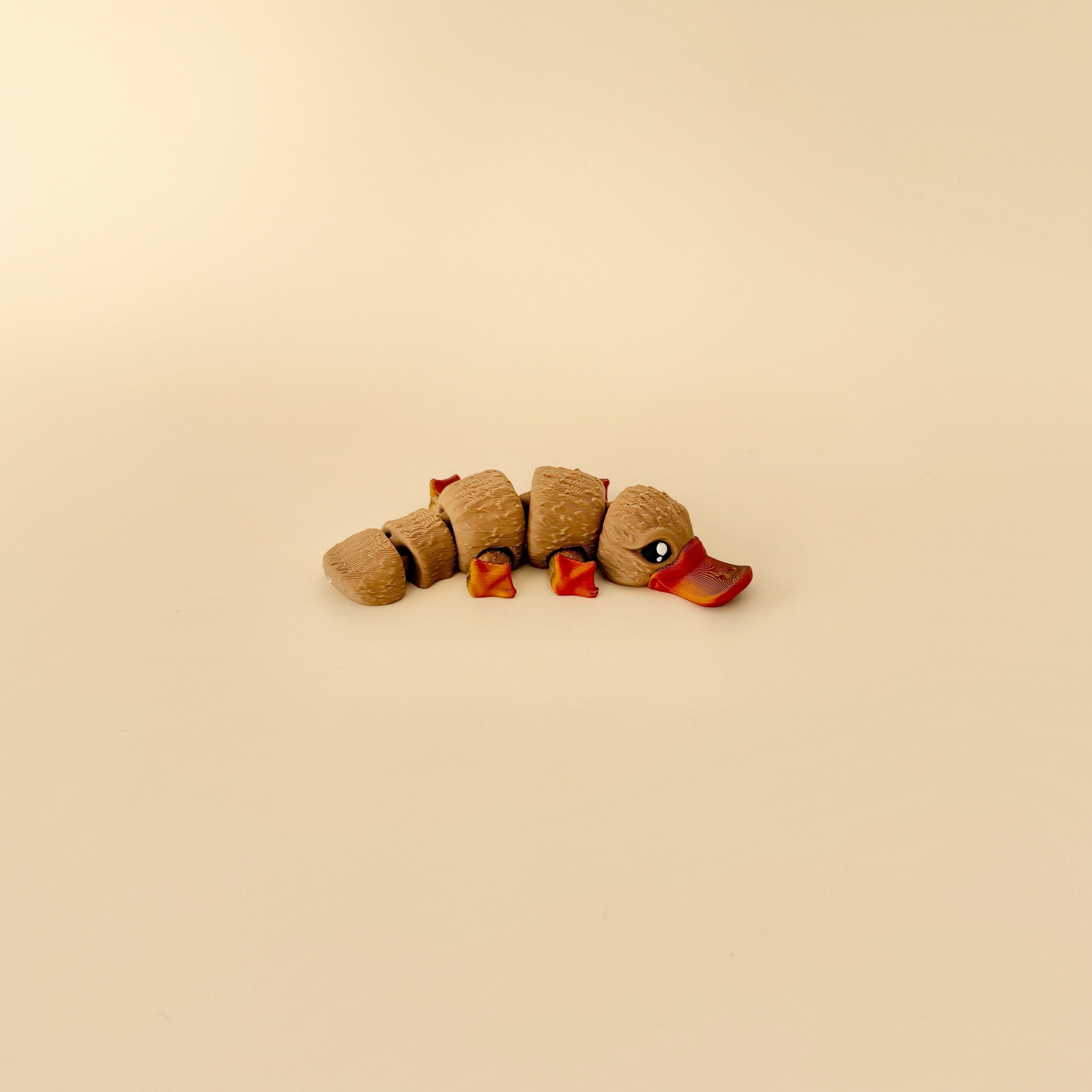 10cm realistic platypus fidget toy with flexible articulation and lifelike features, perfect for play or display.