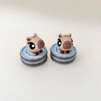 Novelty capybara clicker fidget that sits on a desk and gives a crisp, satisfying click.
