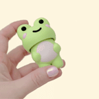 A chunky handheld frog clicker designed for grounding, rhythm and sensory comfort
