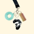 Tap-to-open phone charm for lanyards and keyrings that triggers a chosen call, link, directions or contact.
