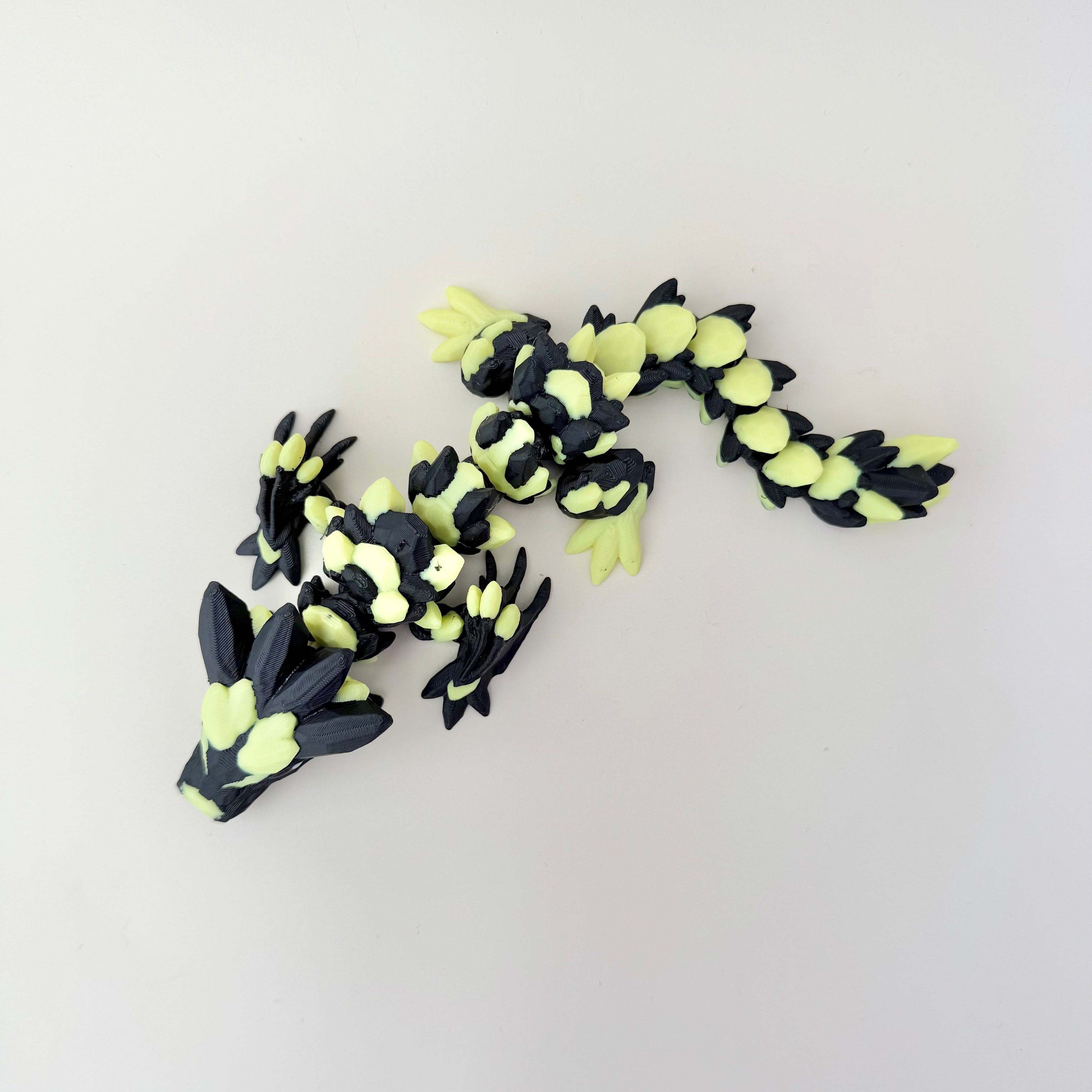 Fully articulated dragon that curls, poses, and moves smoothly in hand.
