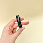 Customisable rolling fidget with frame and wheel colour choices for everyday sensory regulation and stimming.