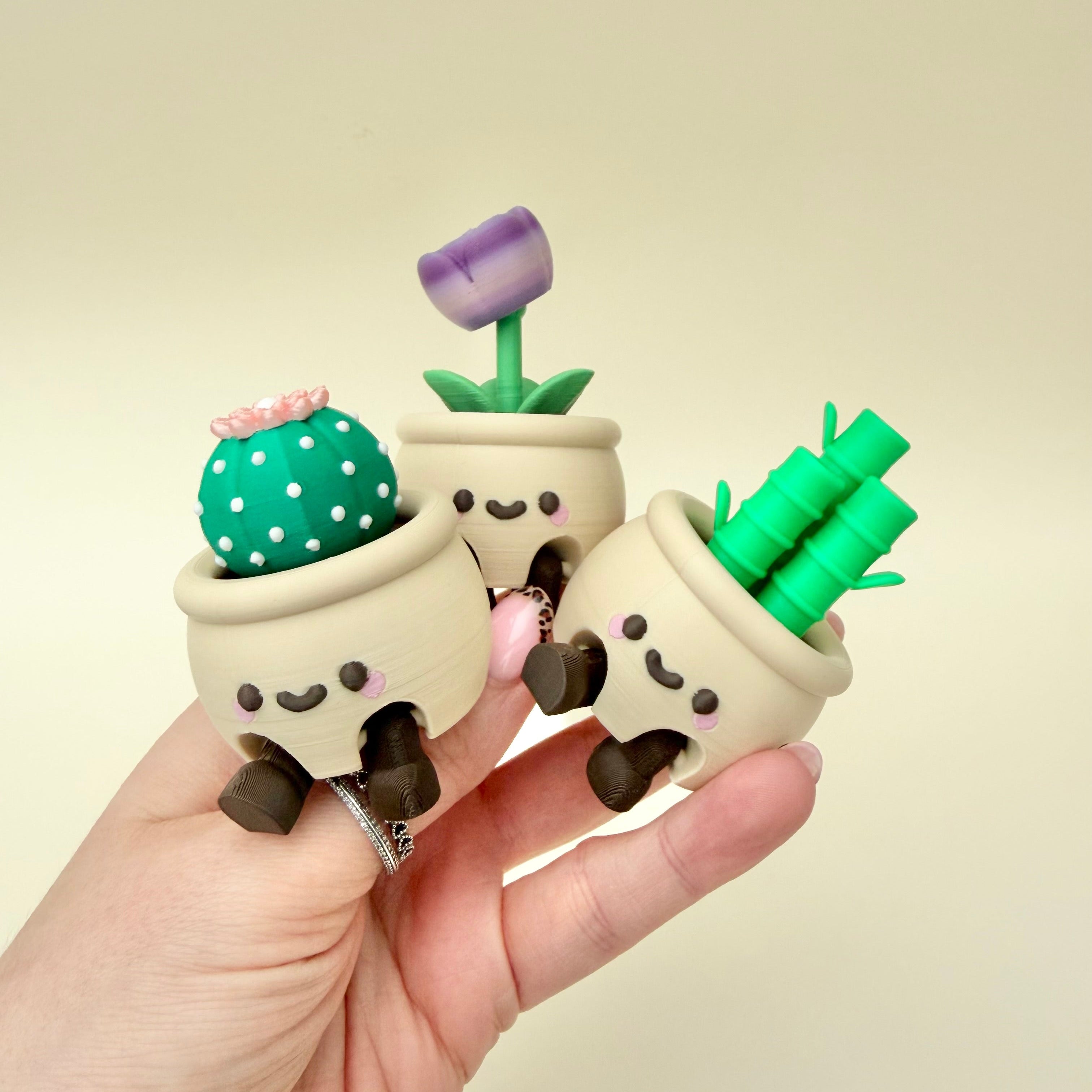 Small desk-friendly clicker fidget disguised as a plant pot, great for focus breaks and sensory regulation.
