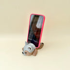3D printed cute phone holder with sleepy puppy design for workspaces, bedrooms and cosy desk setups.