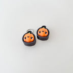 compact pumpkin clicker with raised surfaces suitable for sensory play
