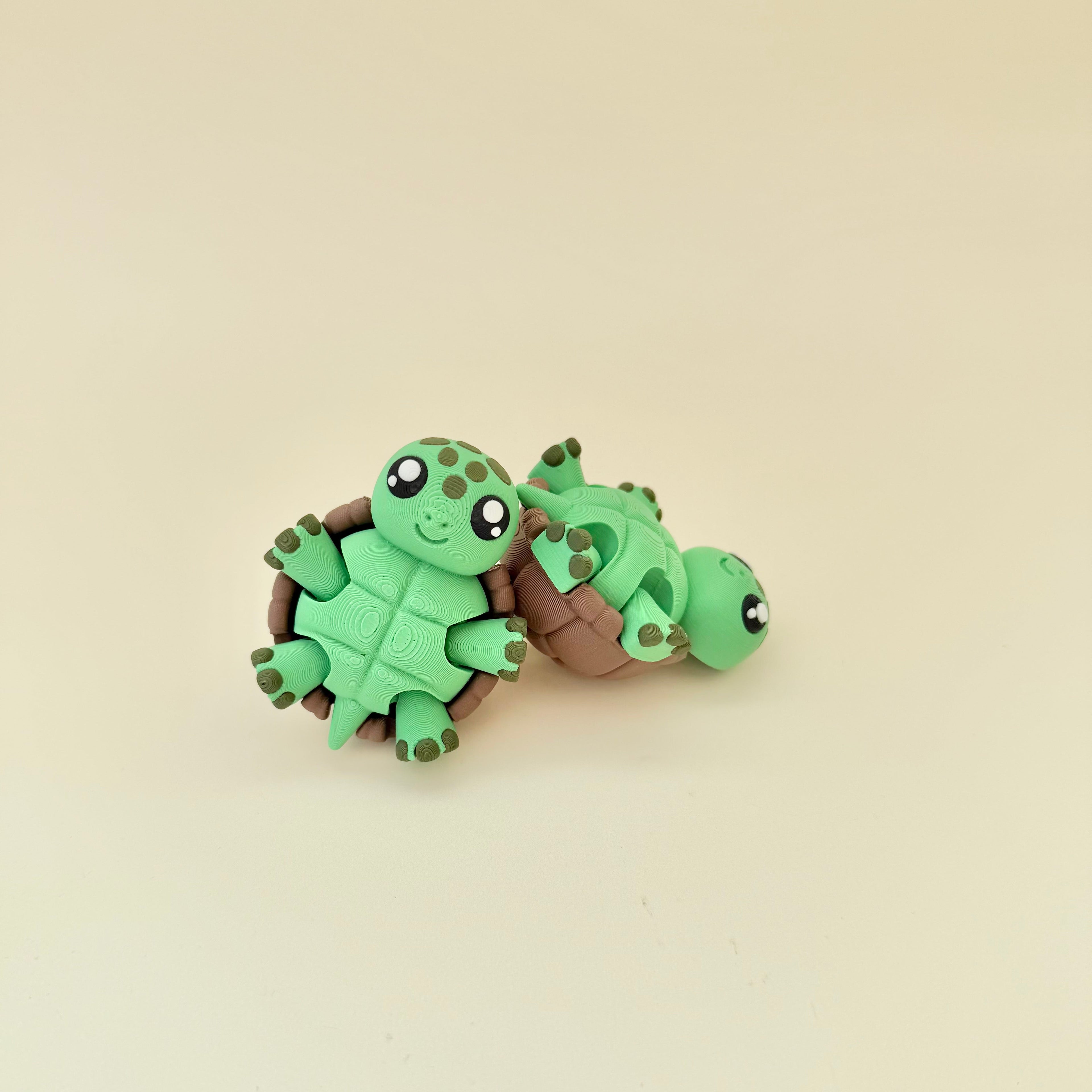 Turtle clicker fidget with press feedback, tracing details and movement for stimming and focus support.