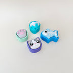 Mini cat clickers designed for tactile play, gifting and portable sensory support.
