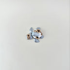 Collectible mini turtle fidget, 3D printed, cookies-and-cream theme, portable size for everyday stimming.