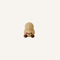 Cute mini character with dangling legs designed for desks, shelves and bedside display in neuro-friendly spaces
