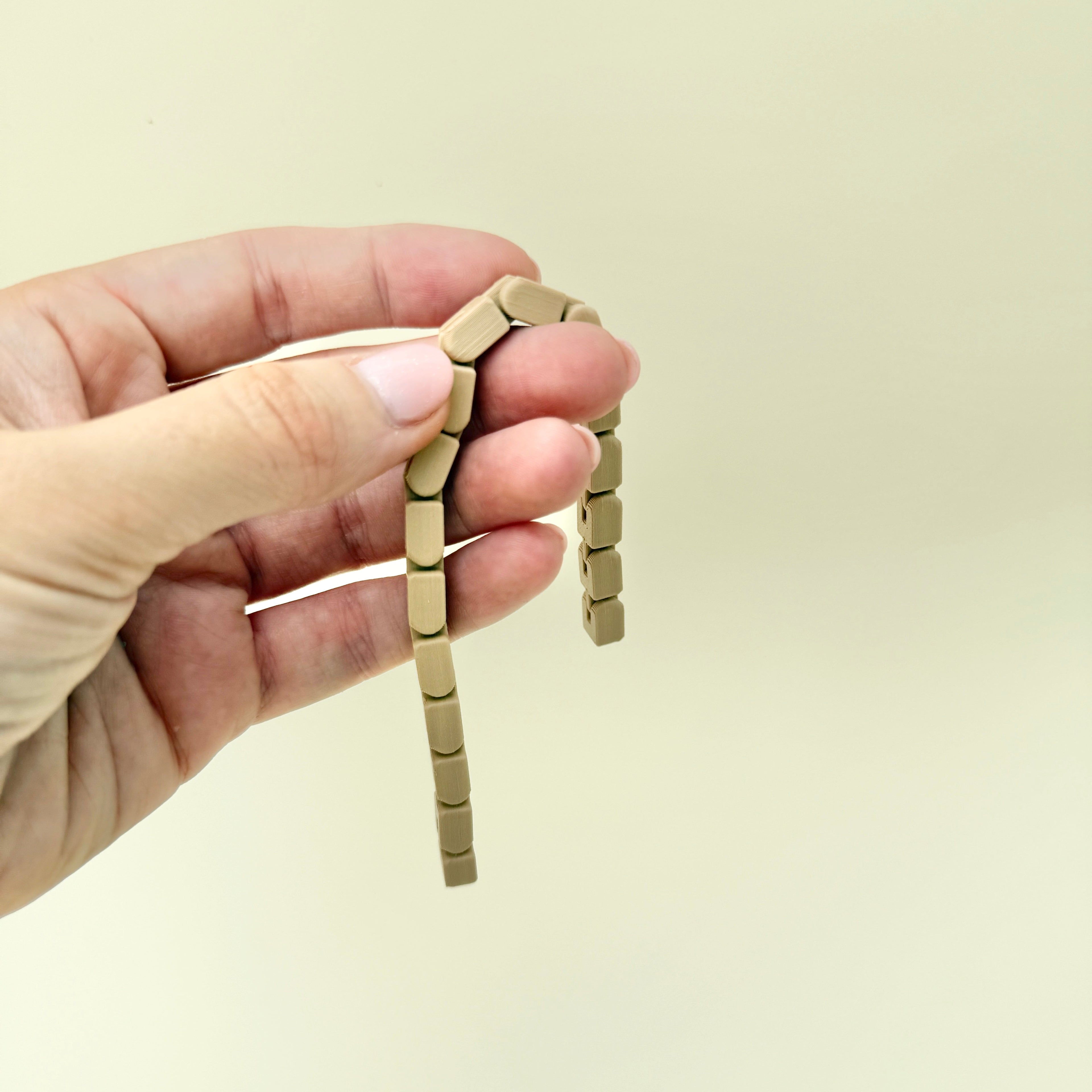 Smooth rolling finger fidget designed for calming movement, focus support and everyday stimming.