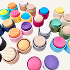 Compact two-button sensory clicker designed to bend into a comfortable position in the hand.