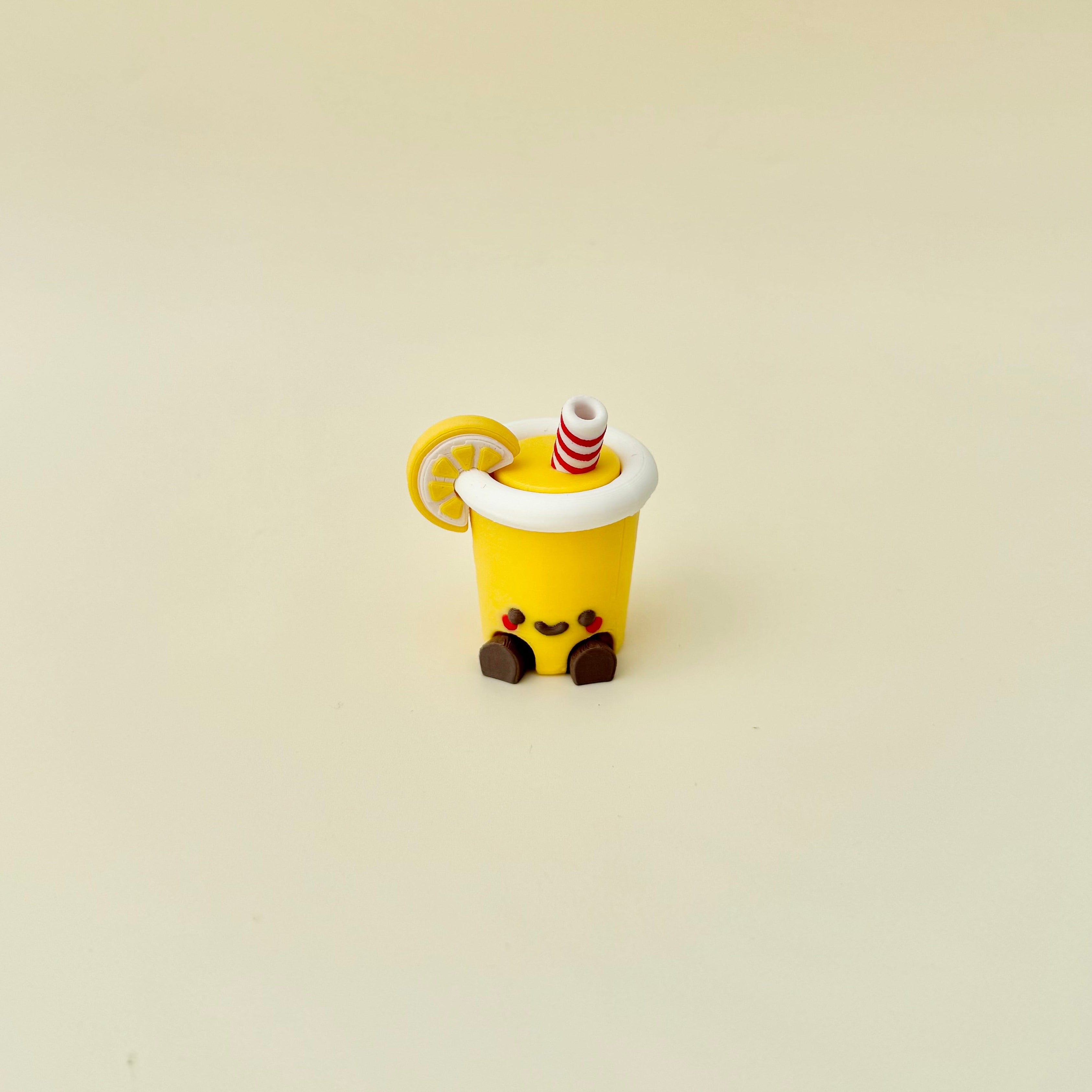 Small drink-themed sensory clicker with tactile details, click feedback and everyday fidget use.