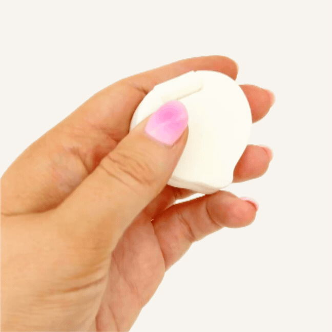 Cute dumpling flip fidget with twisting movement, smooth tactile feel and handheld sensory use.