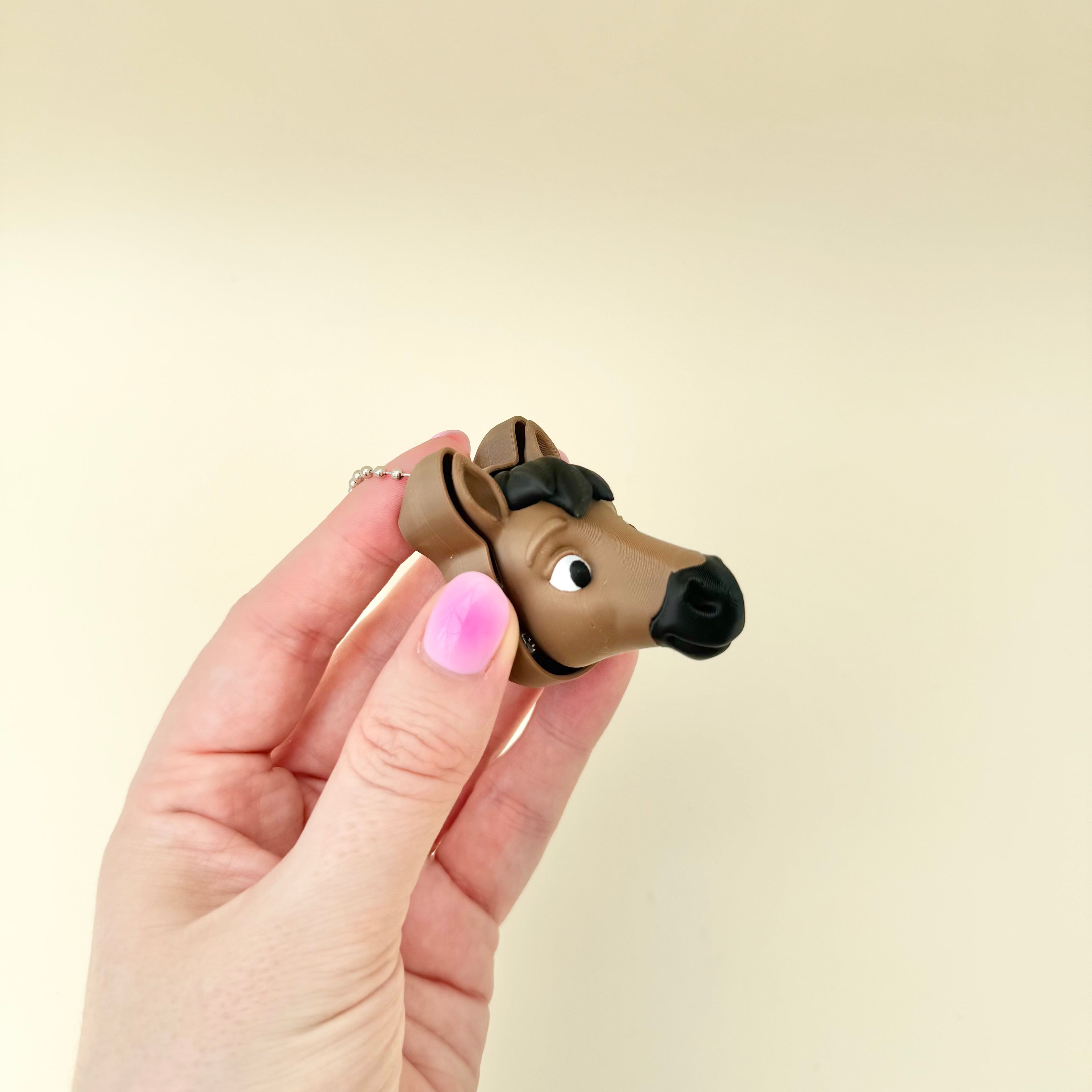 Horse lover sensory clicker with tactile press feedback, keyring attachment and everyday fidget use.