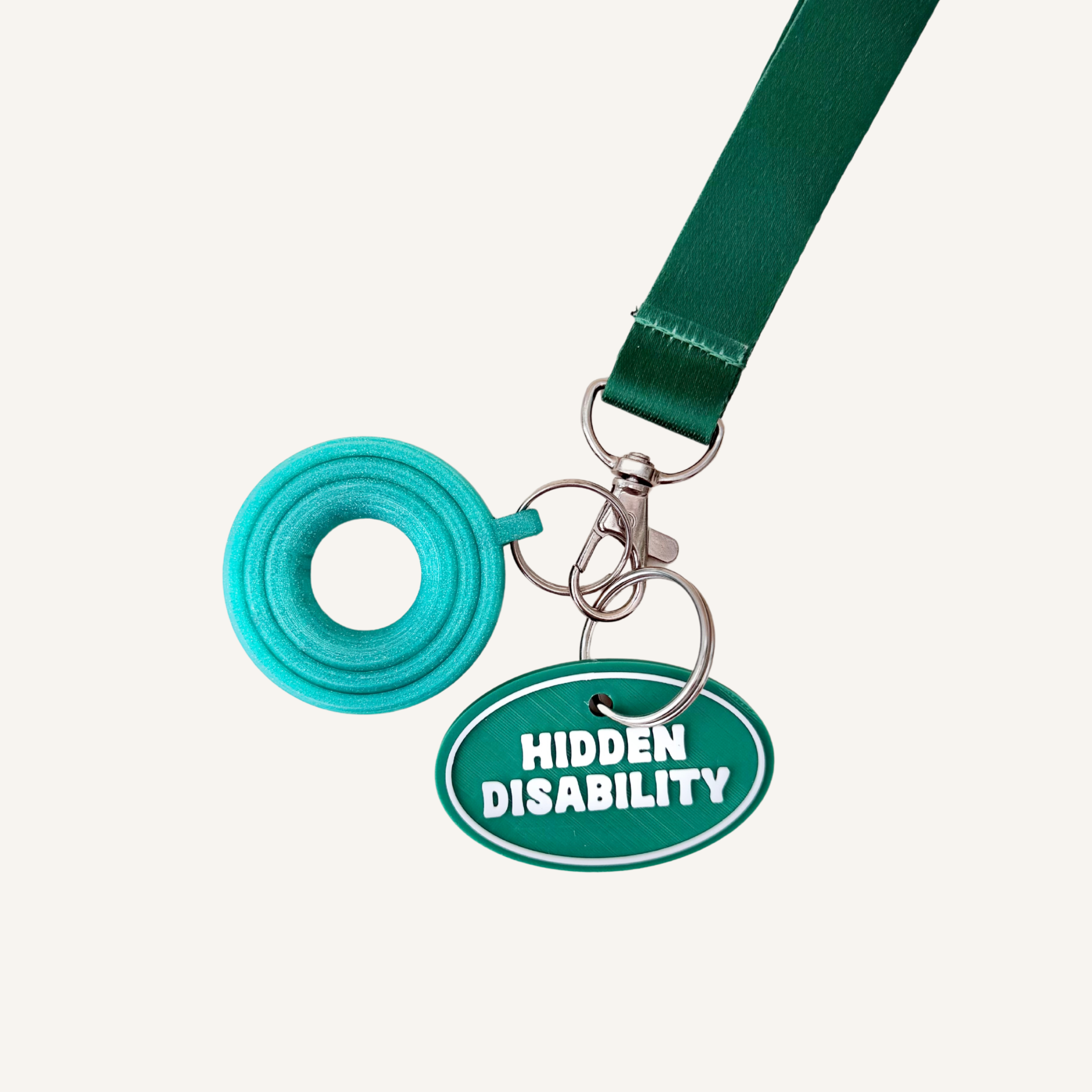Oval support tag designed for visible communication in work, school, travel and public spaces.