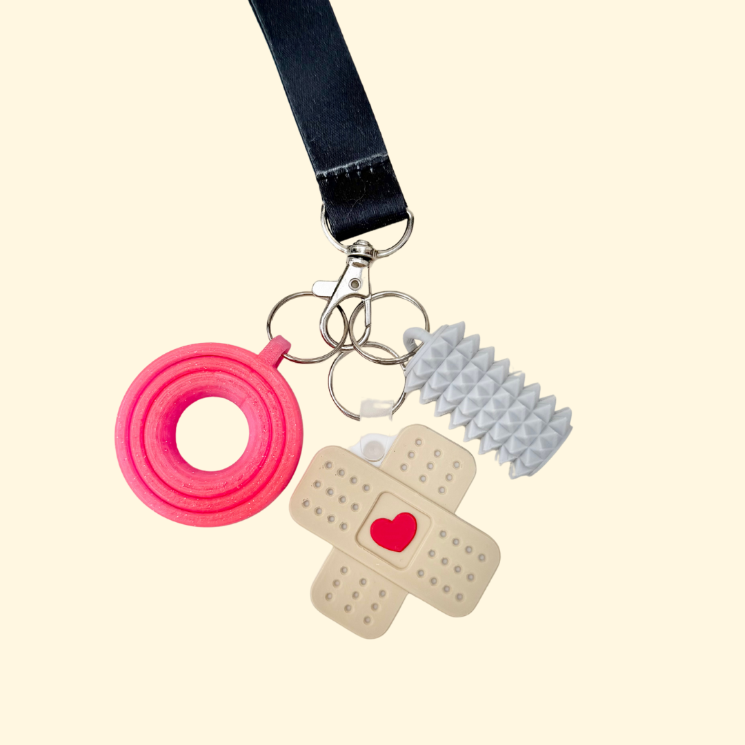 Tap-to-call contact tag for lanyards or keys, programmed before shipping for emergency calls or directions.
