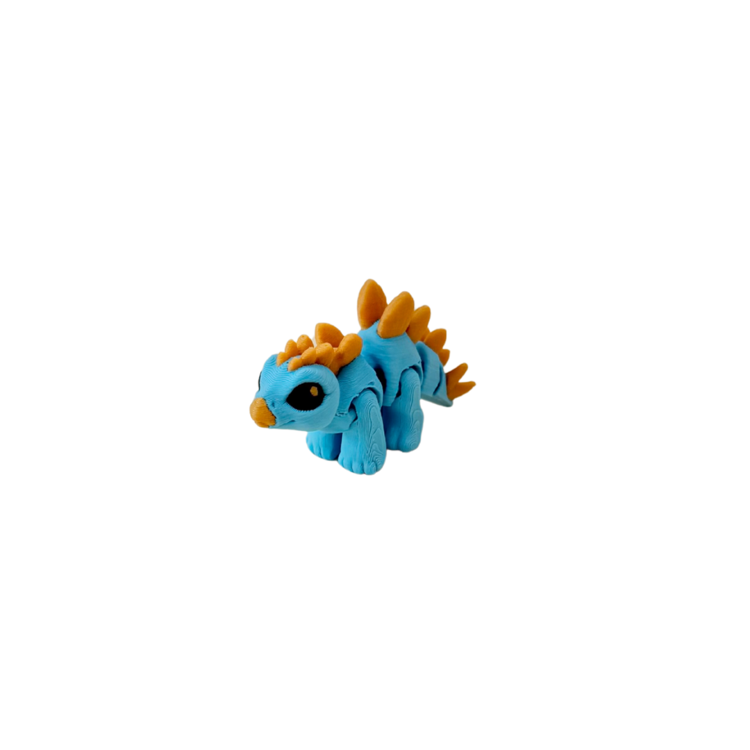 Collectable articulated animal fidget; colour variations occur; fun gift for neurodivergent users, fidget fans, and collectors.
