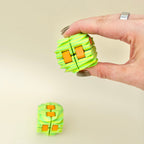 Flip fidget with sculpted ripple surfaces designed for continuous reshaping and tactile stimulation.
