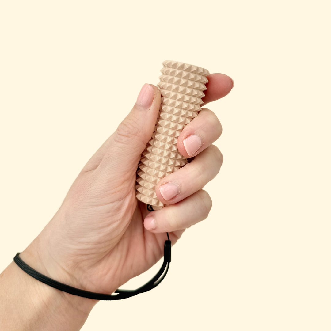 A firm-textured sensory roller designed for deep pressure stimulation and fidget relief.