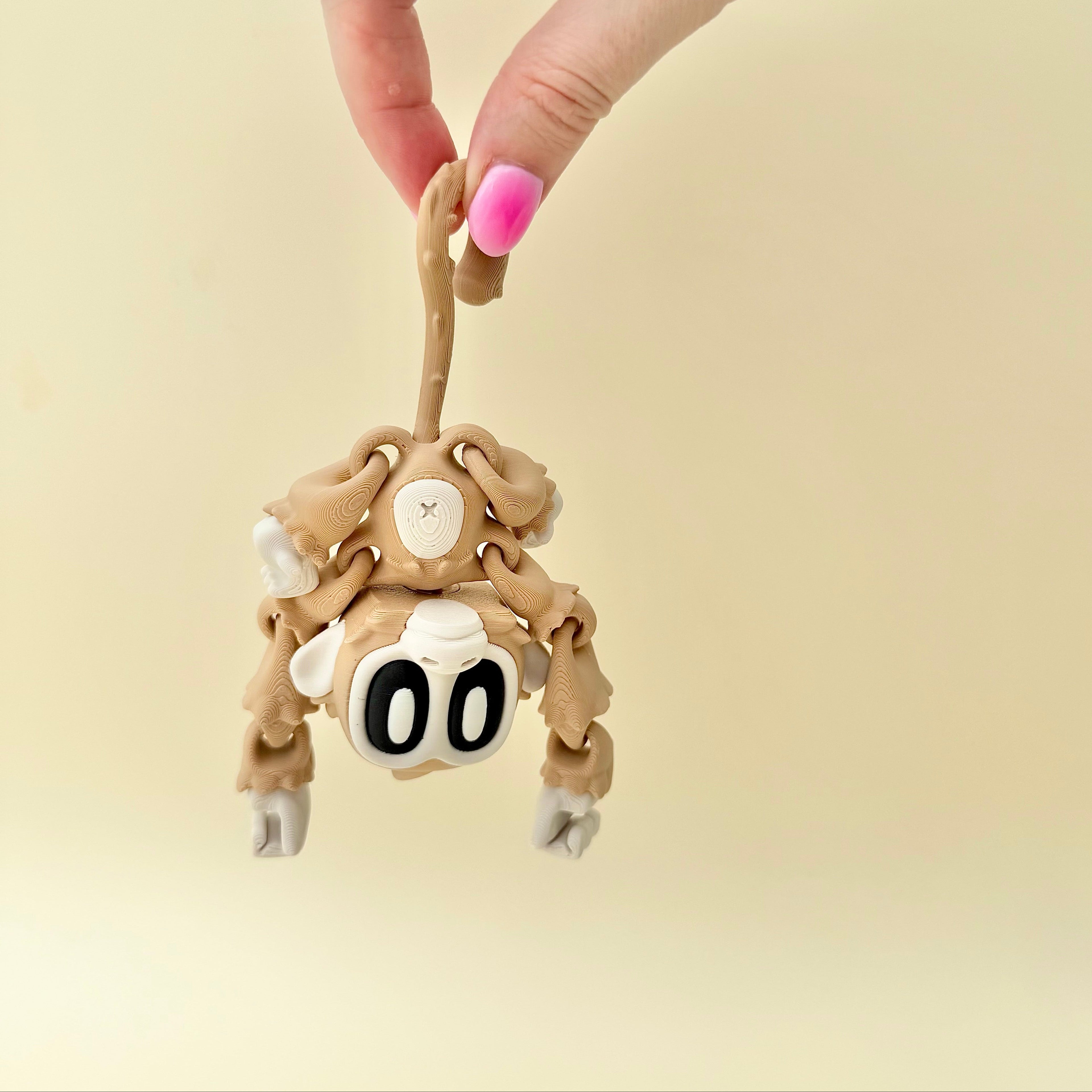 Cute articulated monkey sensory toy with smooth movement, tactile details and fidget-friendly design.