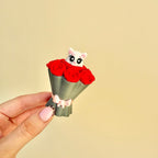 Statement sized clicker combining tactile feedback with a decorative design.

