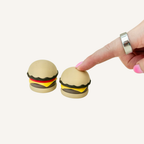 Food-themed clicker fidget with tactile burger details for busy hands, stimming and focus support.