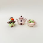 Teapot clicker that pairs with our frog and cottage-themed fidgets for collectors.